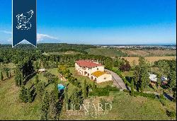 Farm with olive groves for sale near the Tuscan coast