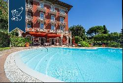 Prestigious hotel for sale directly overlooking the lake in the province of Brescia