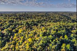 Sweeping River Views Atop Natural Wooded Escape