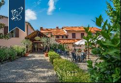 Luxury hotel surrounded by nature for sale in Arcidosso