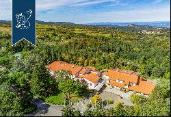 Luxury hotel surrounded by nature for sale in Arcidosso