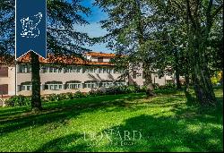 Luxury hotel surrounded by nature for sale in Arcidosso