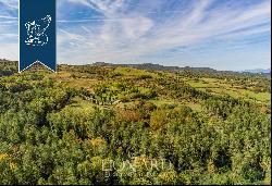 Luxury hotel surrounded by nature for sale in Arcidosso