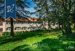 Luxury hotel surrounded by nature for sale in Arcidosso