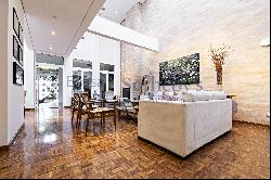 Renovated house with double height ceiling