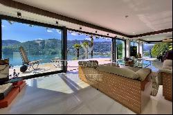 Modern luxury villa overlooking Lake Lugano for sale in Montagnola