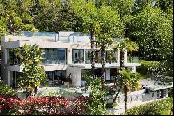 Modern luxury villa overlooking Lake Lugano for sale in Montagnola