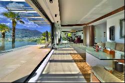 Modern luxury villa overlooking Lake Lugano for sale in Montagnola