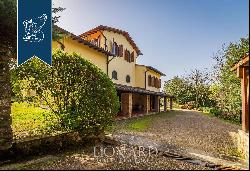 Prestigious estate surroundedby an extraordinary hilly landscape in the Florentine Chianti