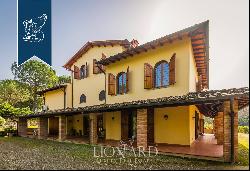 Prestigious estate surroundedby an extraordinary hilly landscape in the Florentine Chianti