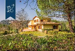 Prestigious estate surroundedby an extraordinary hilly landscape in the Florentine Chianti