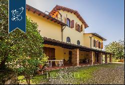 Prestigious estate surroundedby an extraordinary hilly landscape in the Florentine Chianti