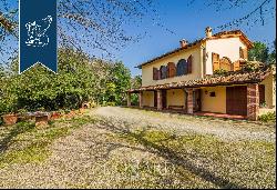 Prestigious estate surroundedby an extraordinary hilly landscape in the Florentine Chianti