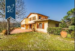 Prestigious estate surroundedby an extraordinary hilly landscape in the Florentine Chianti