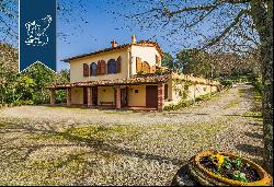 Prestigious estate surroundedby an extraordinary hilly landscape in the Florentine Chianti