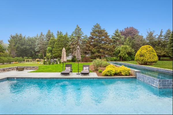Live the Hamptons lifestyle. All on one level!!  Enjoy your retreat in this six bedroom, f