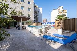 A house with a pool in the heart of the city