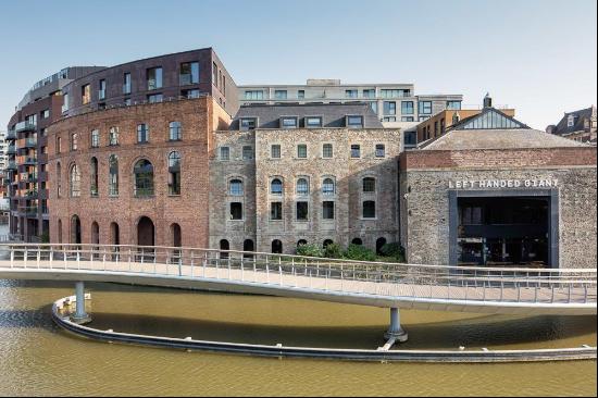 A stunning 2 bedroom riverside apartment with balcony and parking.