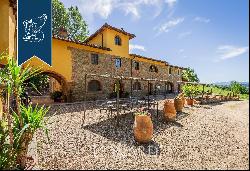 Agricultural farm with recently-renovated resort among the sweet rolling Chianti hills