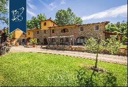 Agricultural farm with recently-renovated resort among the sweet rolling Chianti hills