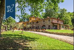 Agricultural farm with recently-renovated resort among the sweet rolling Chianti hills