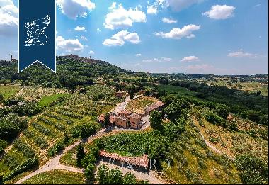 Stunning farmstead with 48 hectares of grounds with vineyards for sale in Tuscany