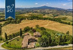 Wonderful farmstead with old farmhouses and 80 hectares of grounds in the Tuscan countrysi