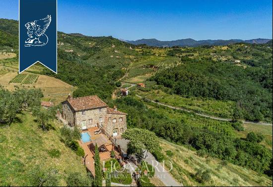 Wisely-renovated old fortress for sale on the hills that embrace the centre of Lucca