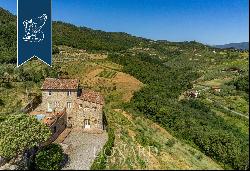 Wisely-renovated old fortress for sale on the hills that embrace the centre of Lucca