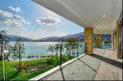 Muzzano: penthouse apartment for sale in front of Lake Lugano with rooftop terrace