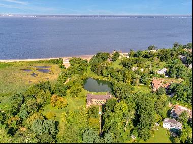 Fall in love with this extraordinary Gold Coast waterfront estate on nearly nine acres of 