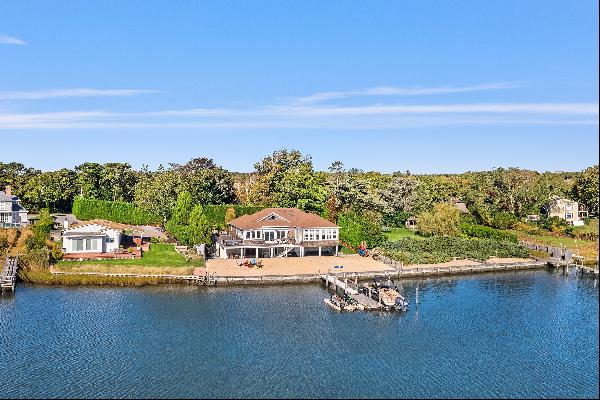 Situated on a half acre this Waterfront property affords spectacular views of Middle Pond 