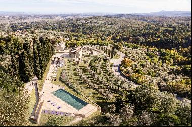 Partially restored historic villa complex dominating the hills of Southern Tuscany