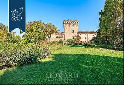 Stunning castle with a 13th-century tower for sale in Cortemaggiore