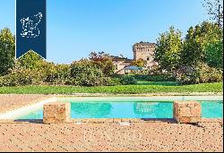 Stunning castle with a 13th-century tower for sale in Cortemaggiore