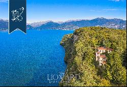 Exclusive lake-facing property with a small private beach and an exclusive dockyard