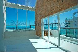 Refurbished penthouse with front sea view