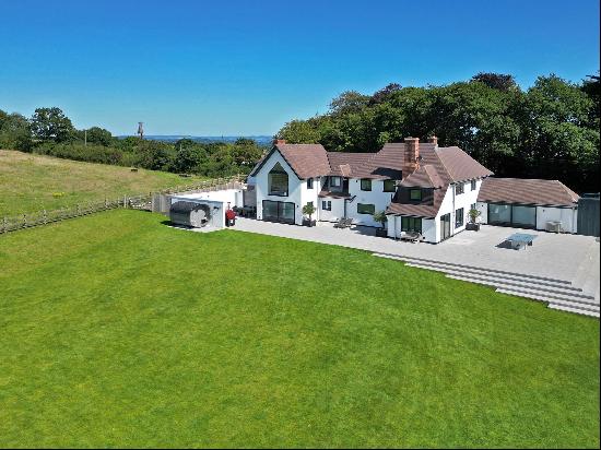 A stunning, luxury detached property with magnificent countryside views, in a peaceful set