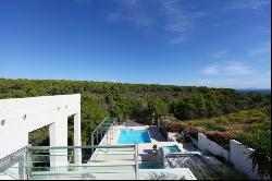 Modern designer villa in Sol de Mallorca with building plot and sea access