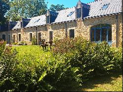 Near Quimper, manor and its dependances renovated.