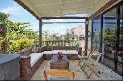 Penthouse on quiet street near the beach