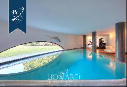 Luxurious modern villa with park and indoor pool close to the Lombard lakes