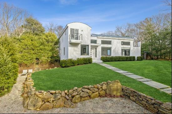 Resting in the heart of East Hampton, this stunning 3600 Sq.Ft. modern is the perfect geta