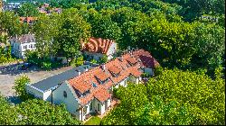 Semi-detached house in Uzupis on the bank of the Vilnele river