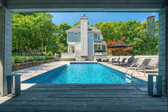 Situated on .60 +/- acres this newly renovated sun-filled Sag Harbor home boasts three bed