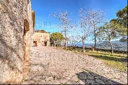 Historic stone finca in Mallorca with panoramic sea views and hunting rights in Escorca