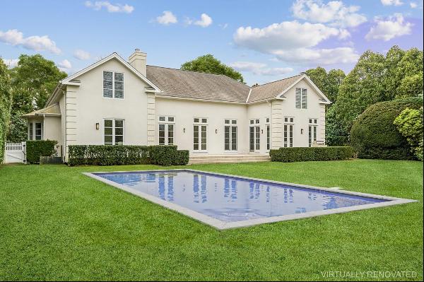 Privately tucked away on a half acre sit this nicely appointed traditional 4 bedroom 4.5 b