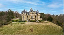 An exceptional listed Neo-Renaissance style chateau set in 70 hectares. 45 minutes from P