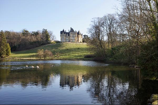 An exceptional listed Neo-Renaissance style chateau set in 70 hectares. 45 minutes from P