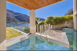 Modern villa for sale in Vico Morcote with garden, swimming pool & magic lake view